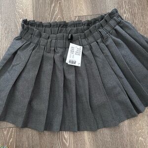 Brand new, never worn, with tags